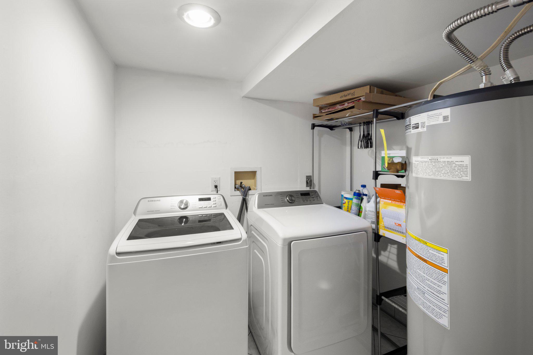1451 Bluemont Court Herndon, VA 20170 - Photo 29 of 33 a utility room with dryer and washer
