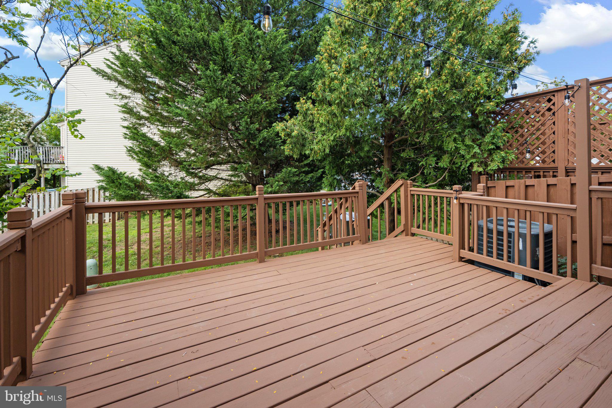 1451 Bluemont Court Herndon, VA 20170 - Photo 31 of 33 a view of deck with wooden floor and fence