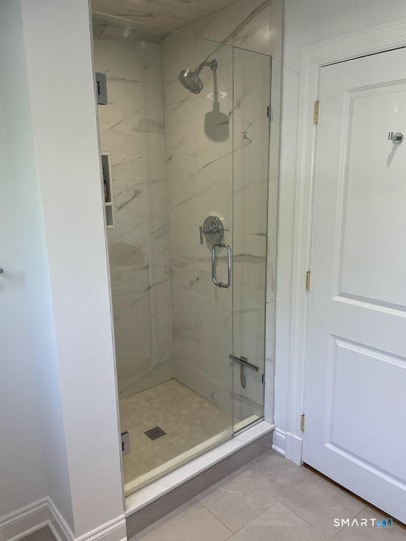 9 Tory Hole Road Darien, CT 06820 - Photo 23 of 33 a bathroom with a shower