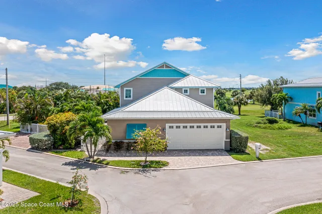 a view of a house with basketball court