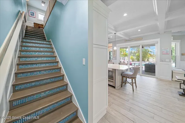 a view of a balcony with a book shelf