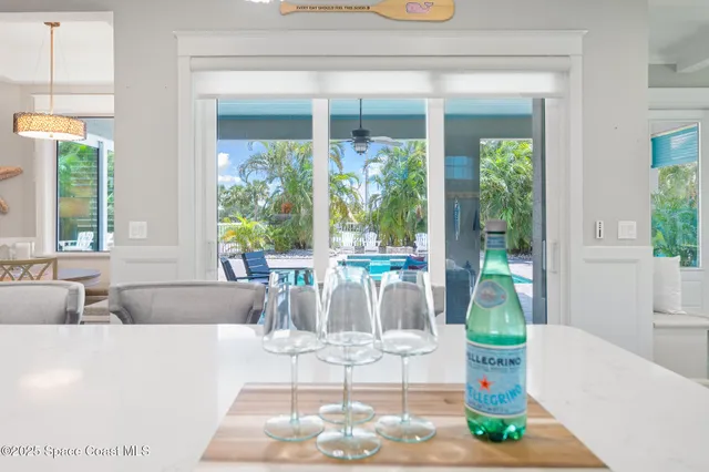 a living room with large windows