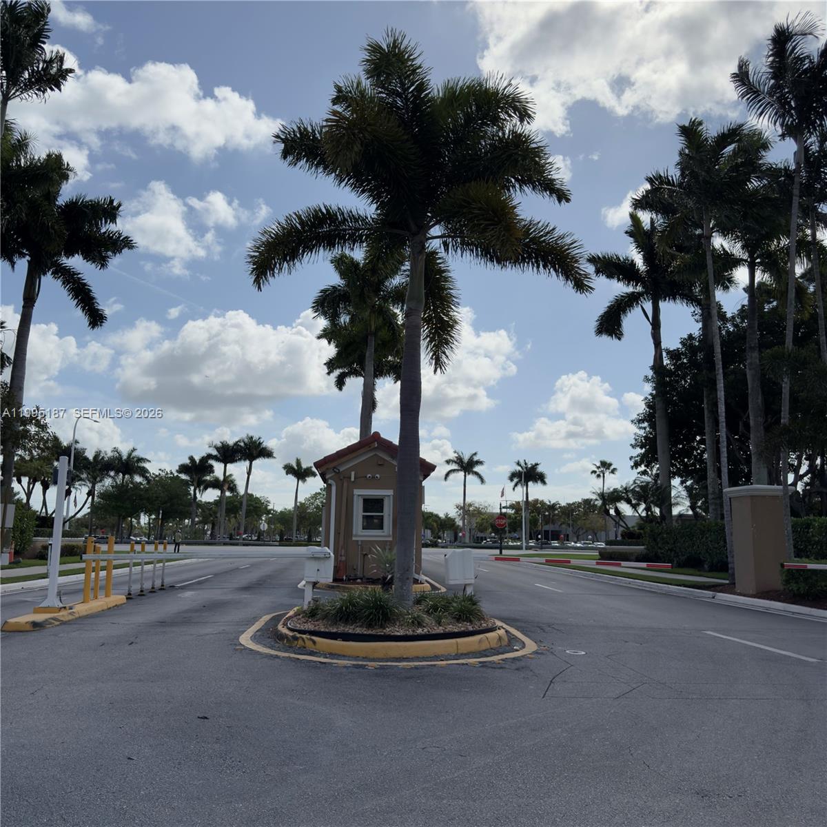16029 Emerald Cove Road Weston, FL 33331 - Photo 12 of 20 a vase of flowers sitting on a table