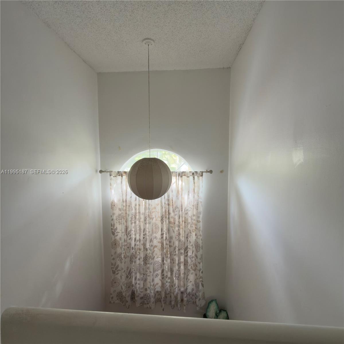 16029 Emerald Cove Road Weston, FL 33331 - Photo 3 of 20 a view of room with a fan