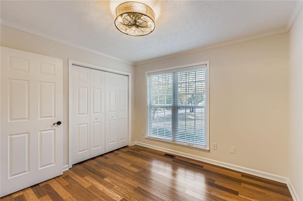 16 Inland Point Newnan, GA 30263 - Photo 16 of 34 a view of a room with wooden floor