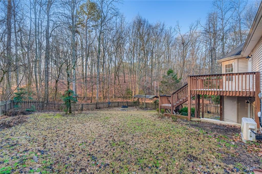 16 Inland Point Newnan, GA 30263 - Photo 28 of 34 a view of a house with a yard and sitting area