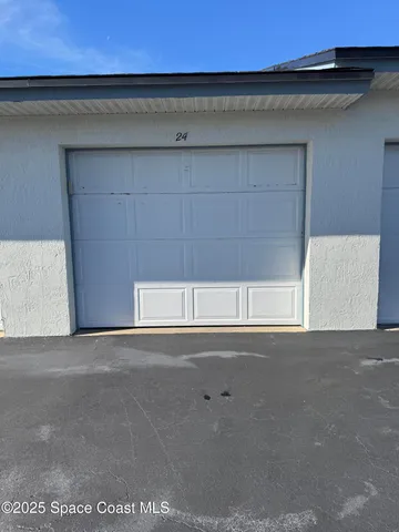 a view of a yard with an outdoor space
