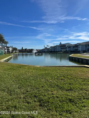 a view of a balcony with an ocean