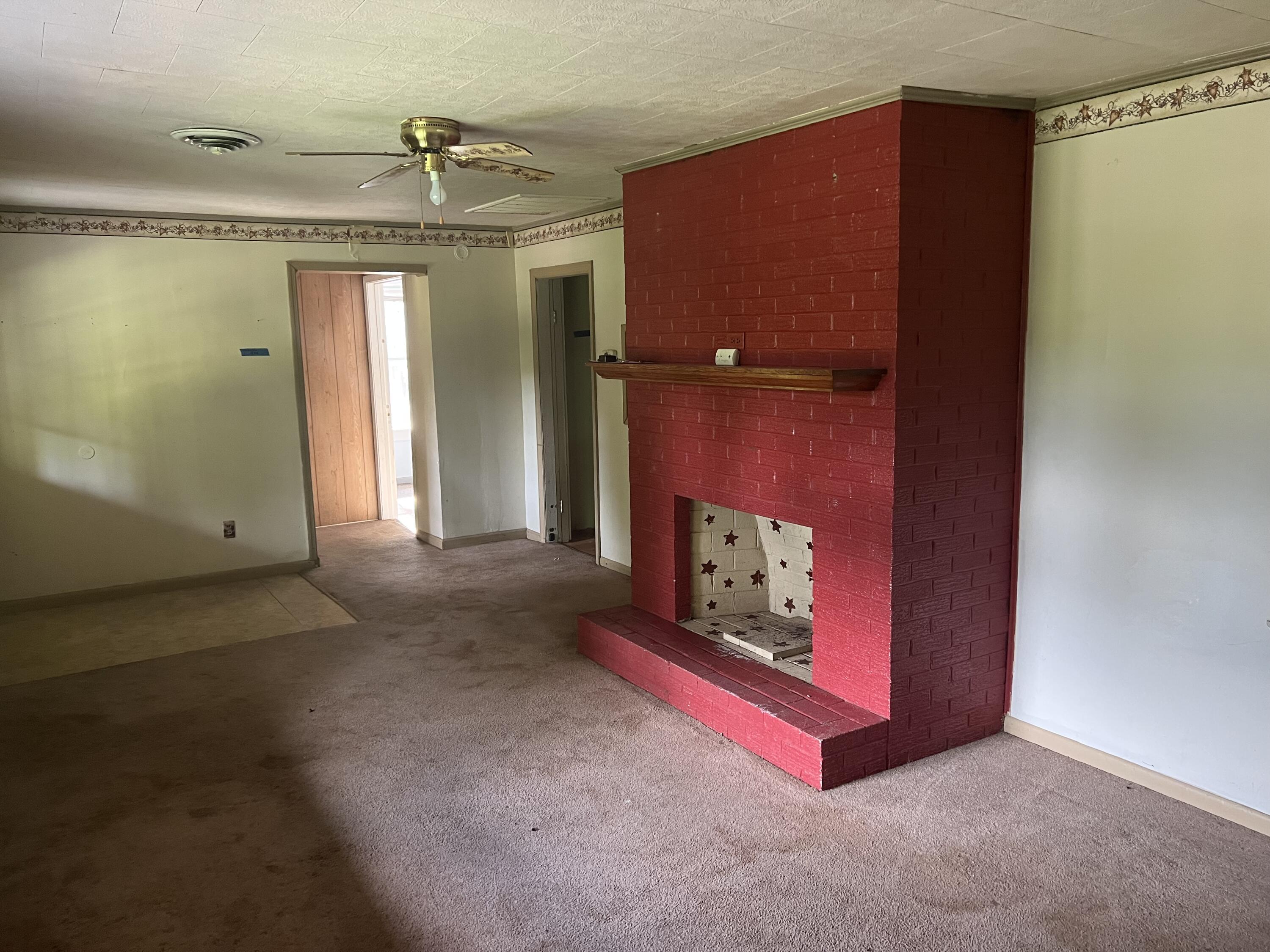 1110 Brookhaven Drive Covington, VA 24426 - Photo 4 of 11 an empty room with windows