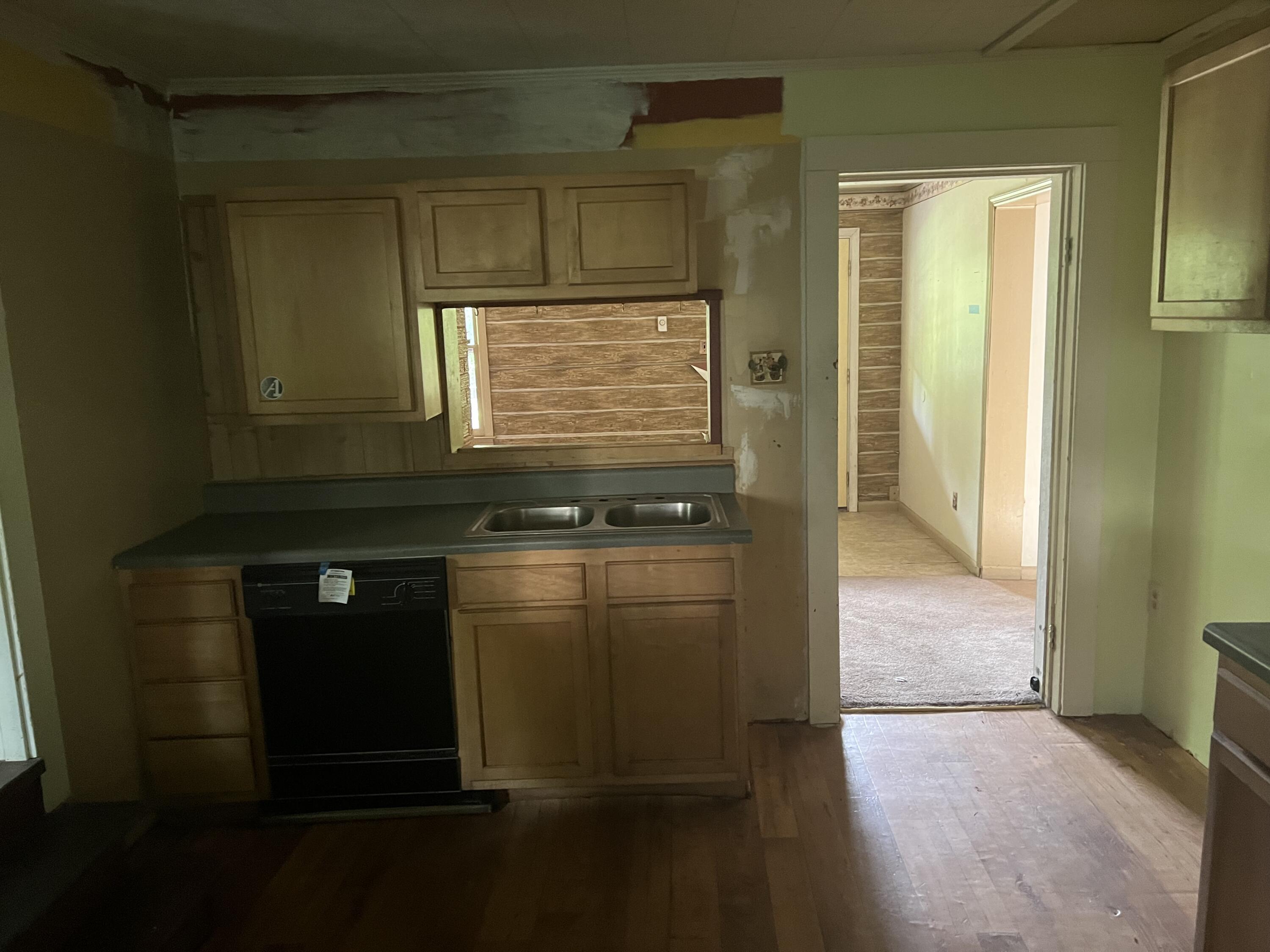 1110 Brookhaven Drive Covington, VA 24426 - Photo 6 of 11 a bathroom with a granite countertop sink and a mirror