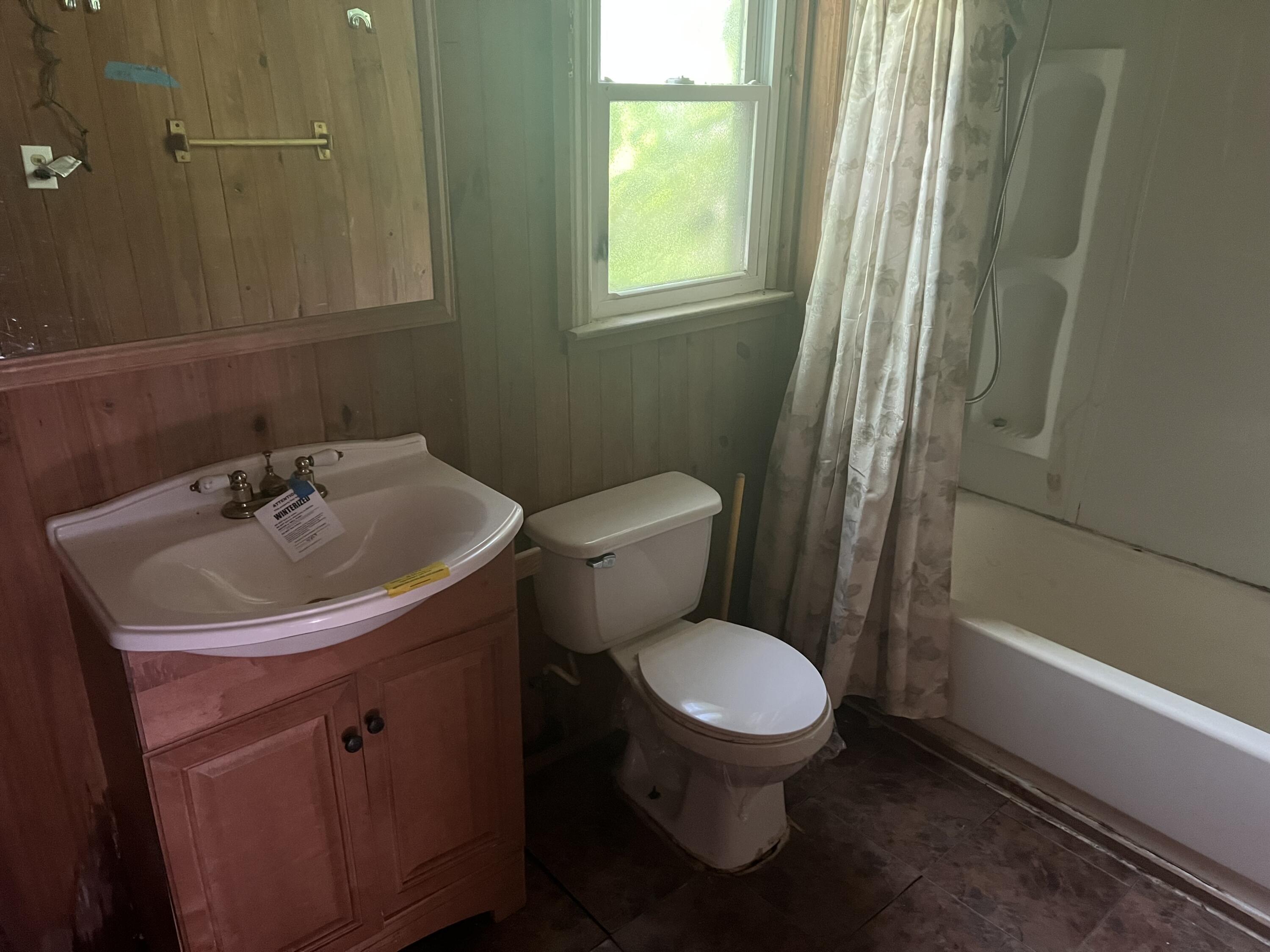1110 Brookhaven Drive Covington, VA 24426 - Photo 10 of 11 a bathroom with a sink toilet and a mirror
