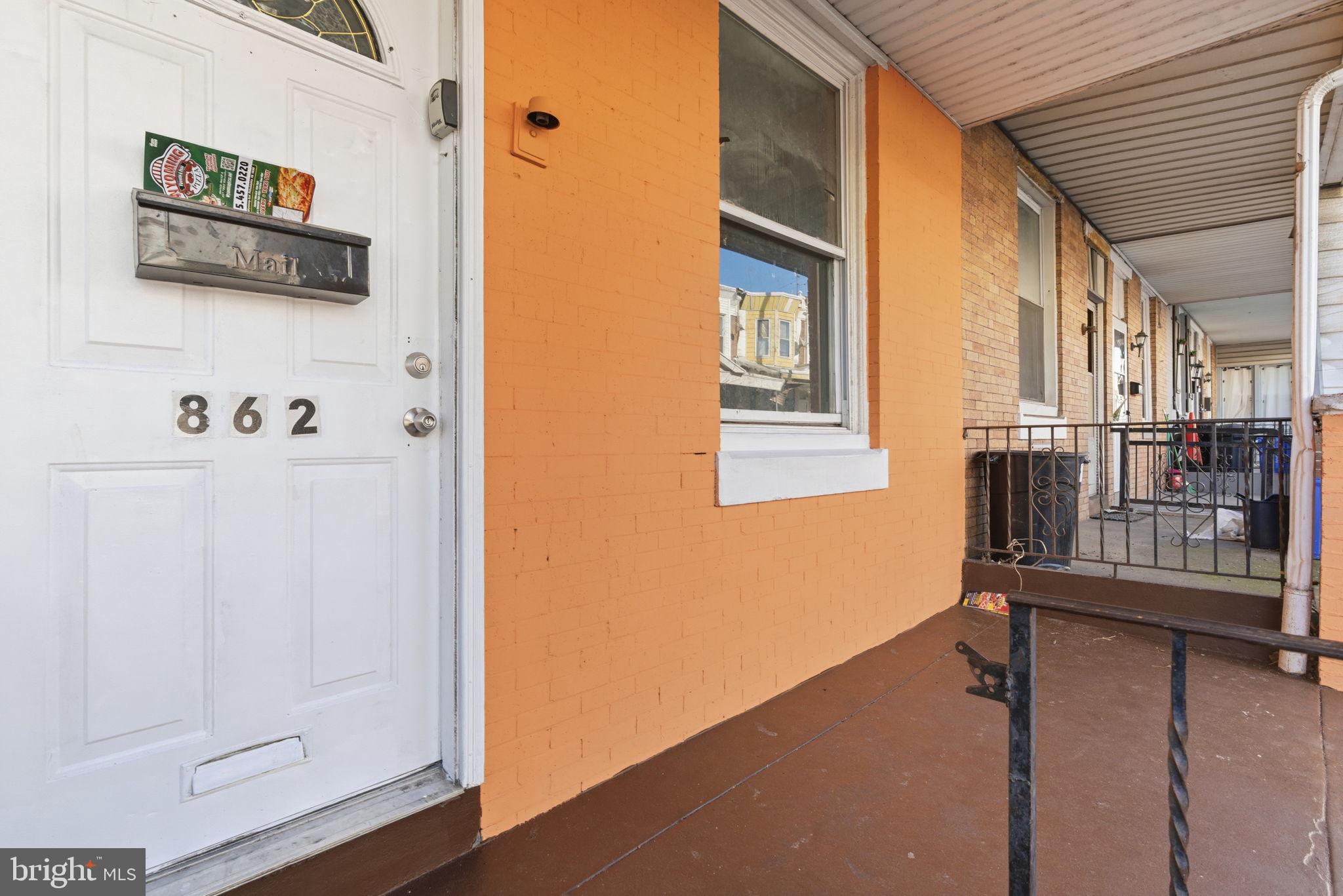 862 East Cornwall Street Philadelphia, PA 19134 - Photo 2 of 16 Charming entryway with vibrant hues.