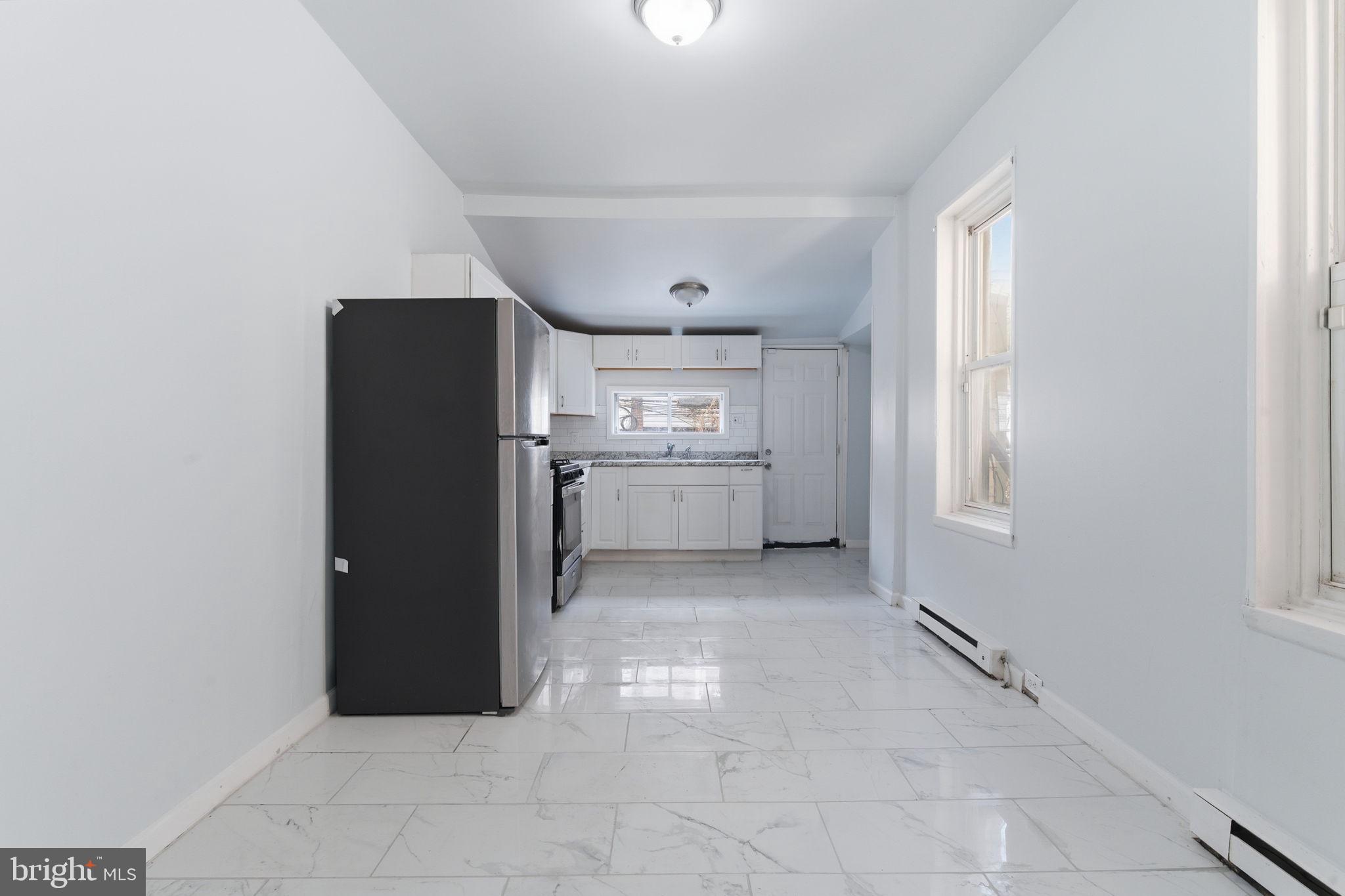 862 East Cornwall Street Philadelphia, PA 19134 - Photo 6 of 16 Large kitchen with space to eat in.