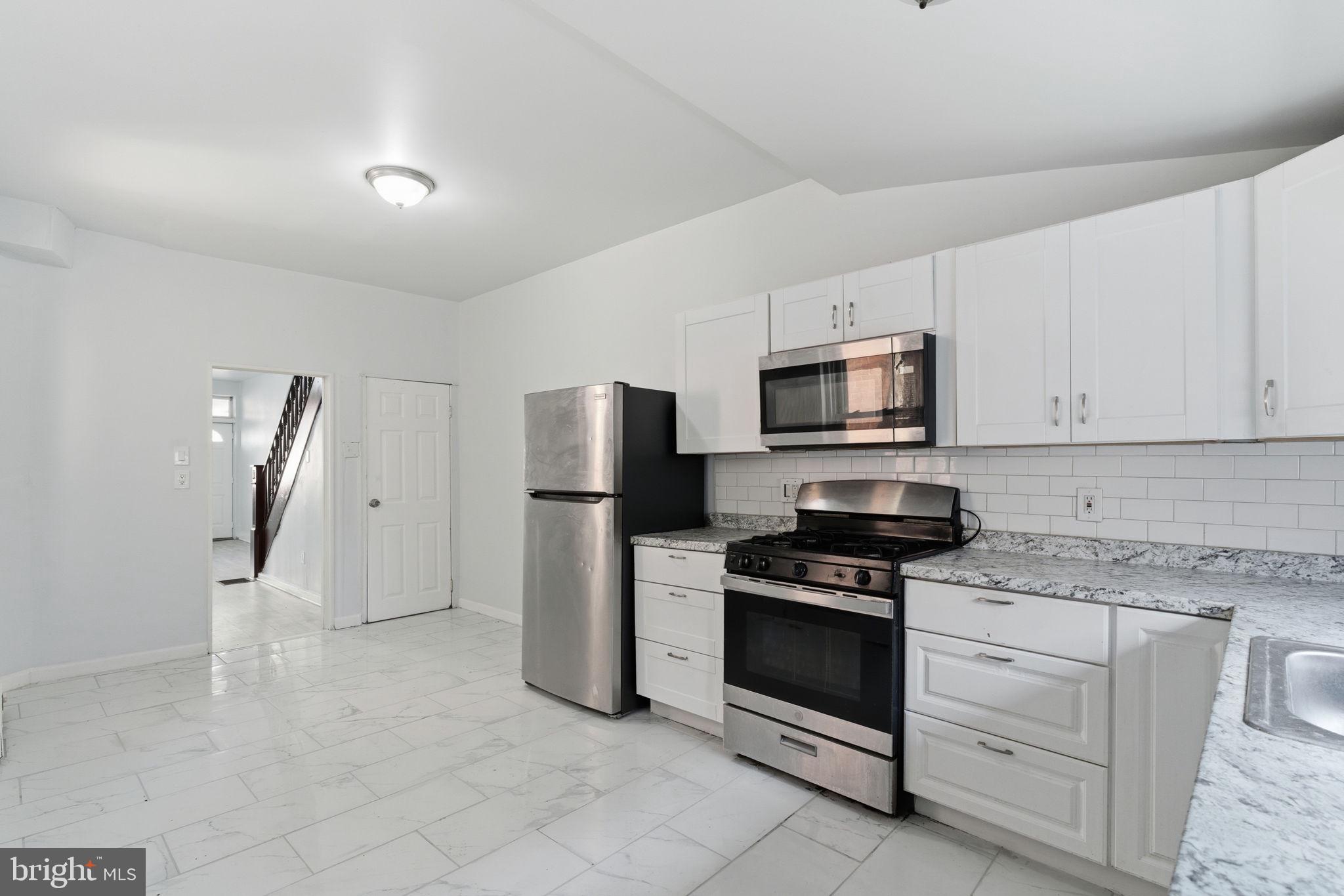 862 East Cornwall Street Philadelphia, PA 19134 - Photo 9 of 16 Kitchen with basement access.