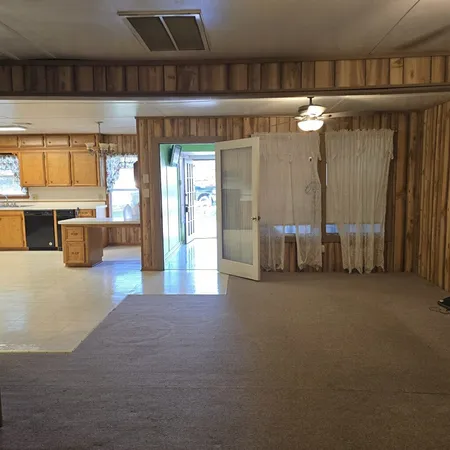 a view of a livingroom with furniture