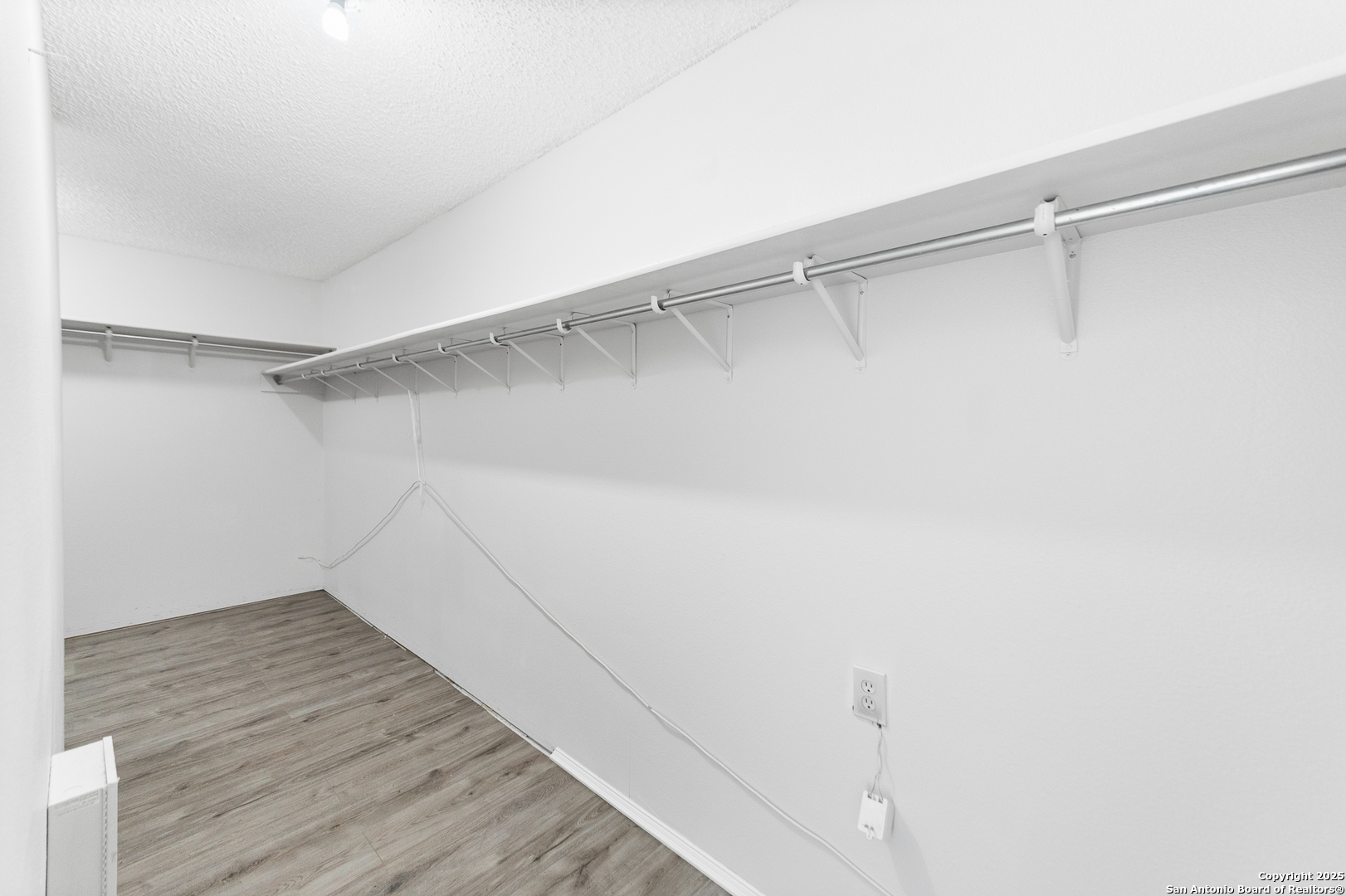 8010 Chestnut Gate Drive Converse, TX 78109 - Photo 21 of 37 a view of an empty walk in closet