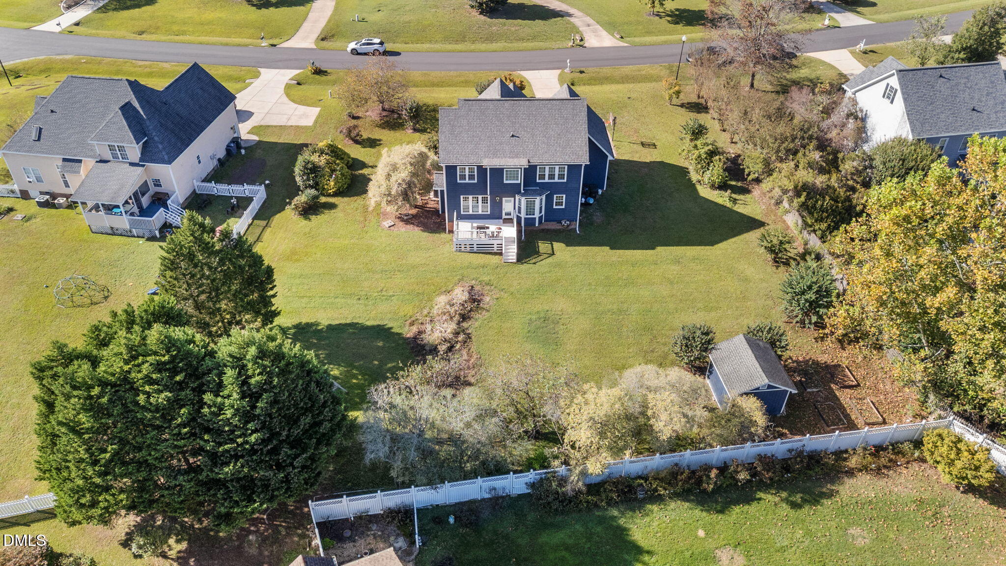 1617 Kendall Hill Road Willow Spring, NC 27592 - Photo 15 of 58 an aerial view of residential houses with outdoor space and swimming pool