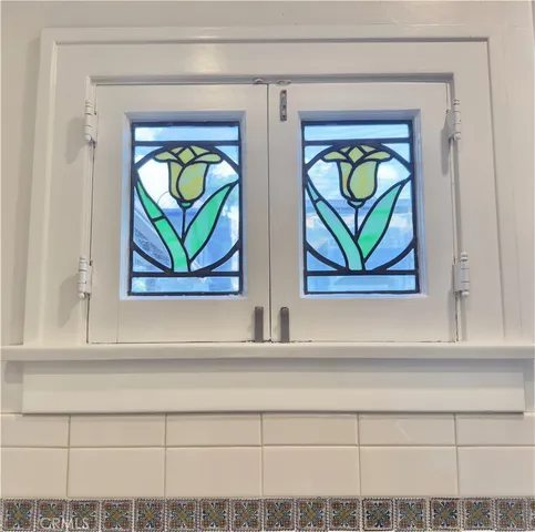 a kitchen with a sink a stove and refrigerator