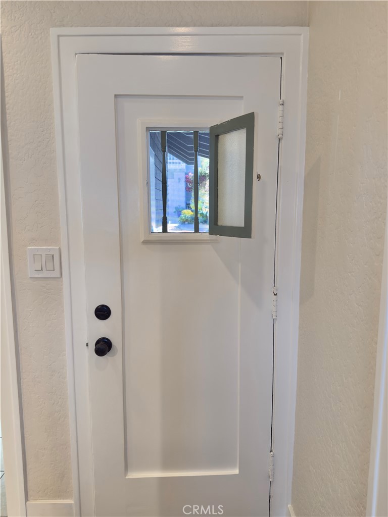 162 Sunset Terrace Laguna Beach, CA 92651 - Photo 8 of 38 Speak easy front door