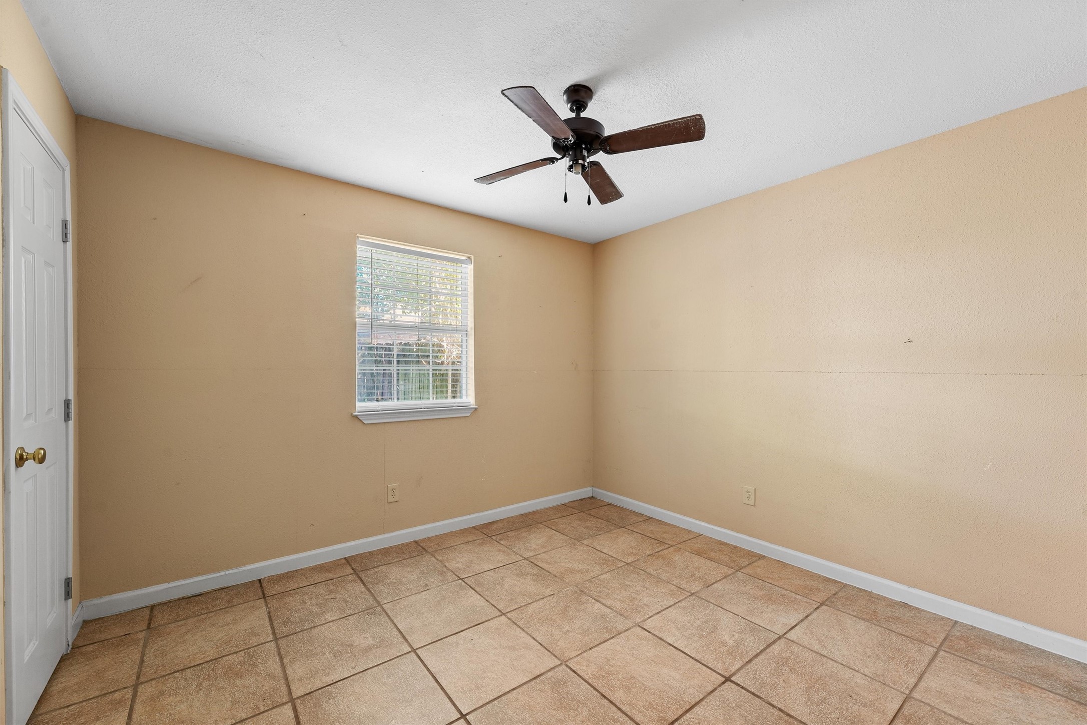 11211 Early Spring Circle Houston, TX 77064 - Photo 23 of 31 a view of a big room with wooden floor and windows in a room