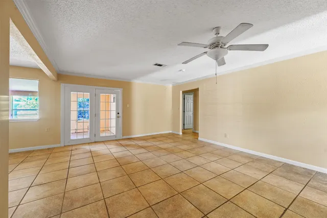 a view of an empty room and window
