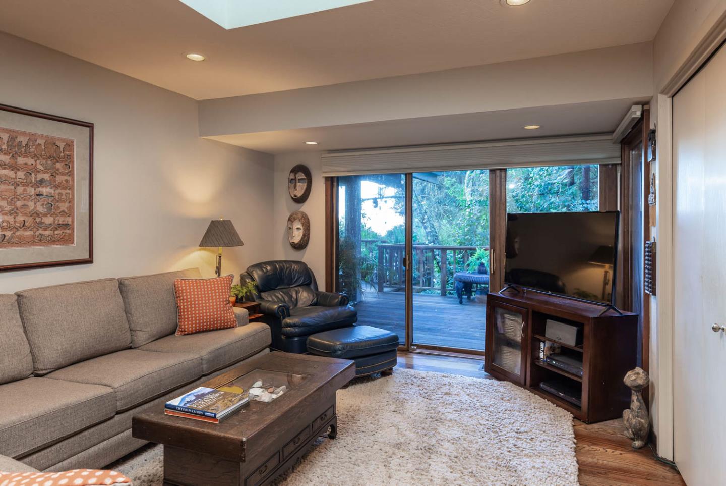 1255 La Honda Road Woodside, CA 94062 - Photo 14 of 26 a living room with furniture and a flat screen tv