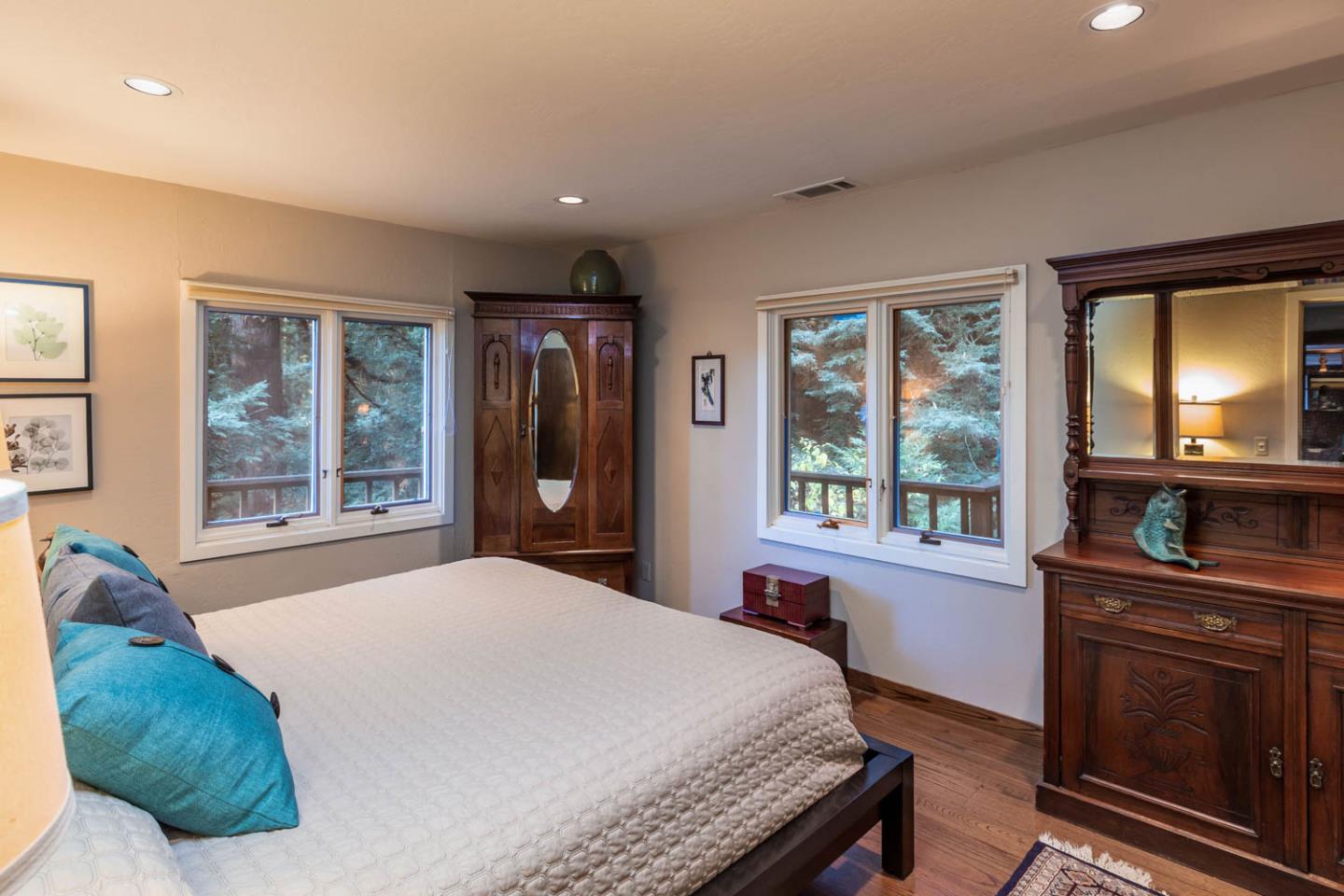 1255 La Honda Road Woodside, CA 94062 - Photo 17 of 26 a bedroom with a bed and a large window