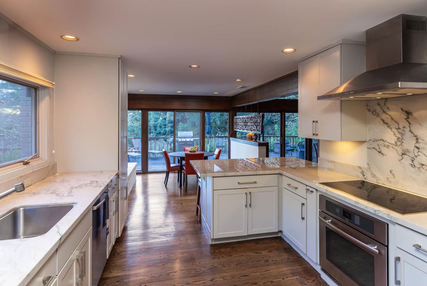 1255 La Honda Road Woodside, CA 94062 - Photo 9 of 26 a large white kitchen with a large window