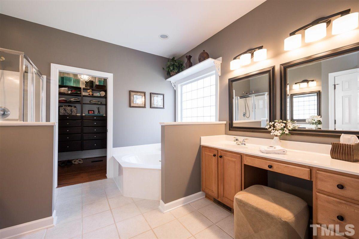 3100 Pyxis Court Raleigh, NC 27614 - Photo 6 of 30 Walk in shower, sunken tub, and dual vanities.
