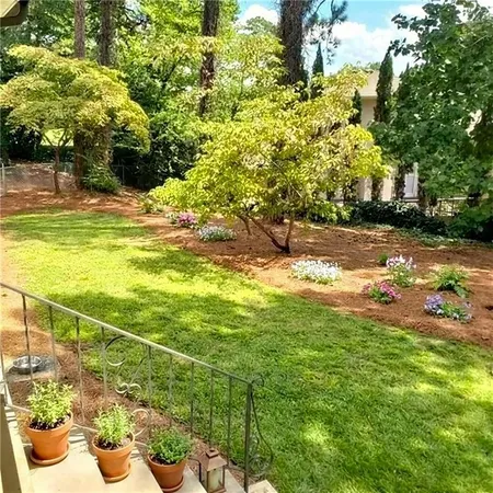 a view of a yard with an outdoor space