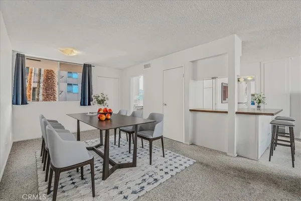 a view of a dining room with furniture