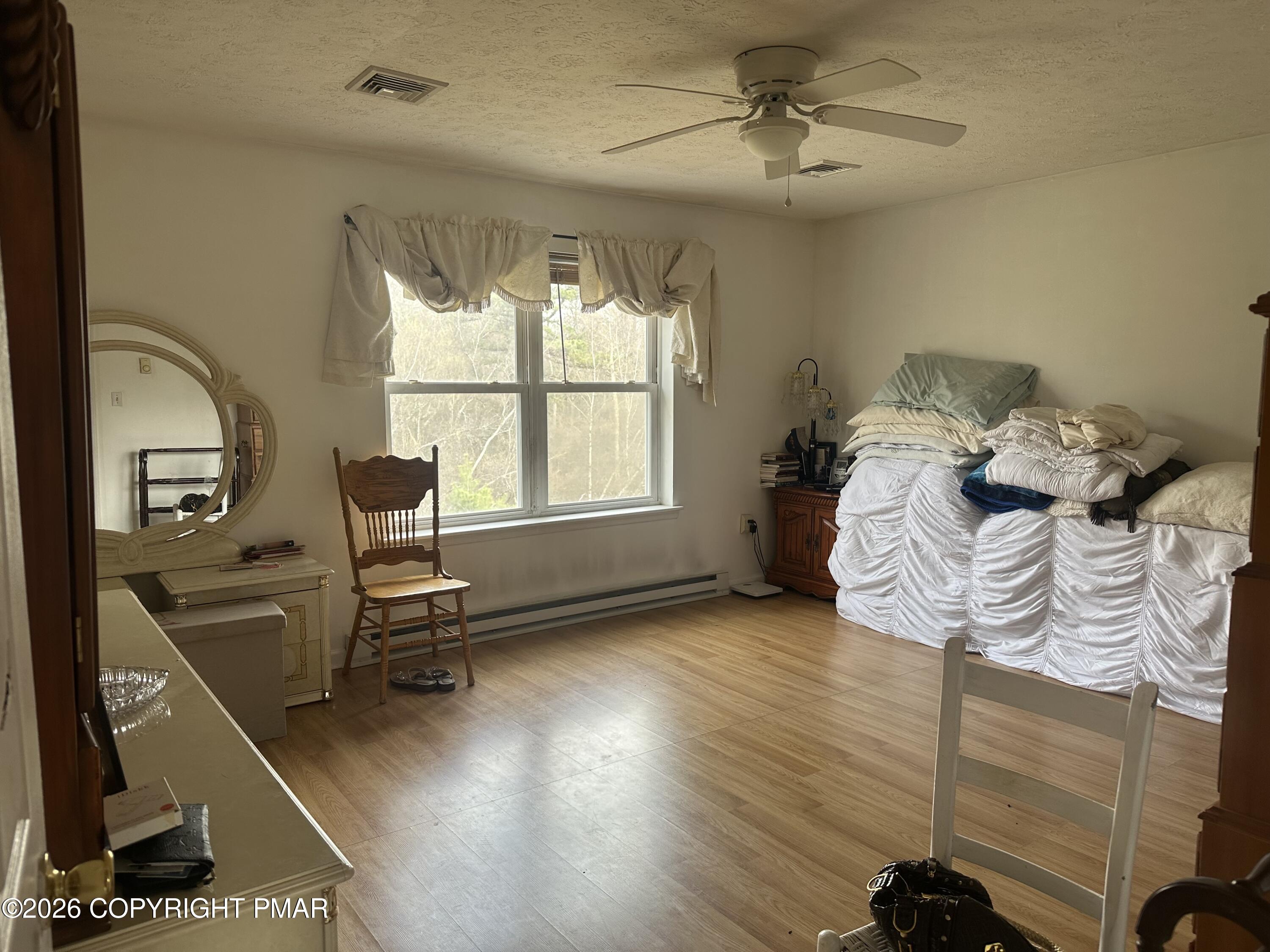 1566 Clover Road Long Pond, PA 18334 - Photo 11 of 29 Primary Bedroom