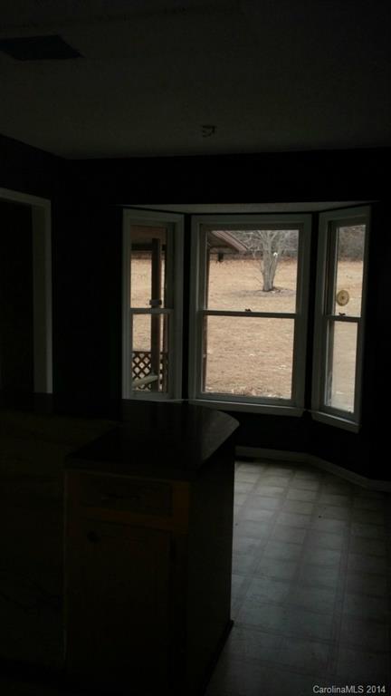 934 State Rd S-28-818 Elgin, SC 29045 - Photo 6 of 15 a view of an empty room with a window