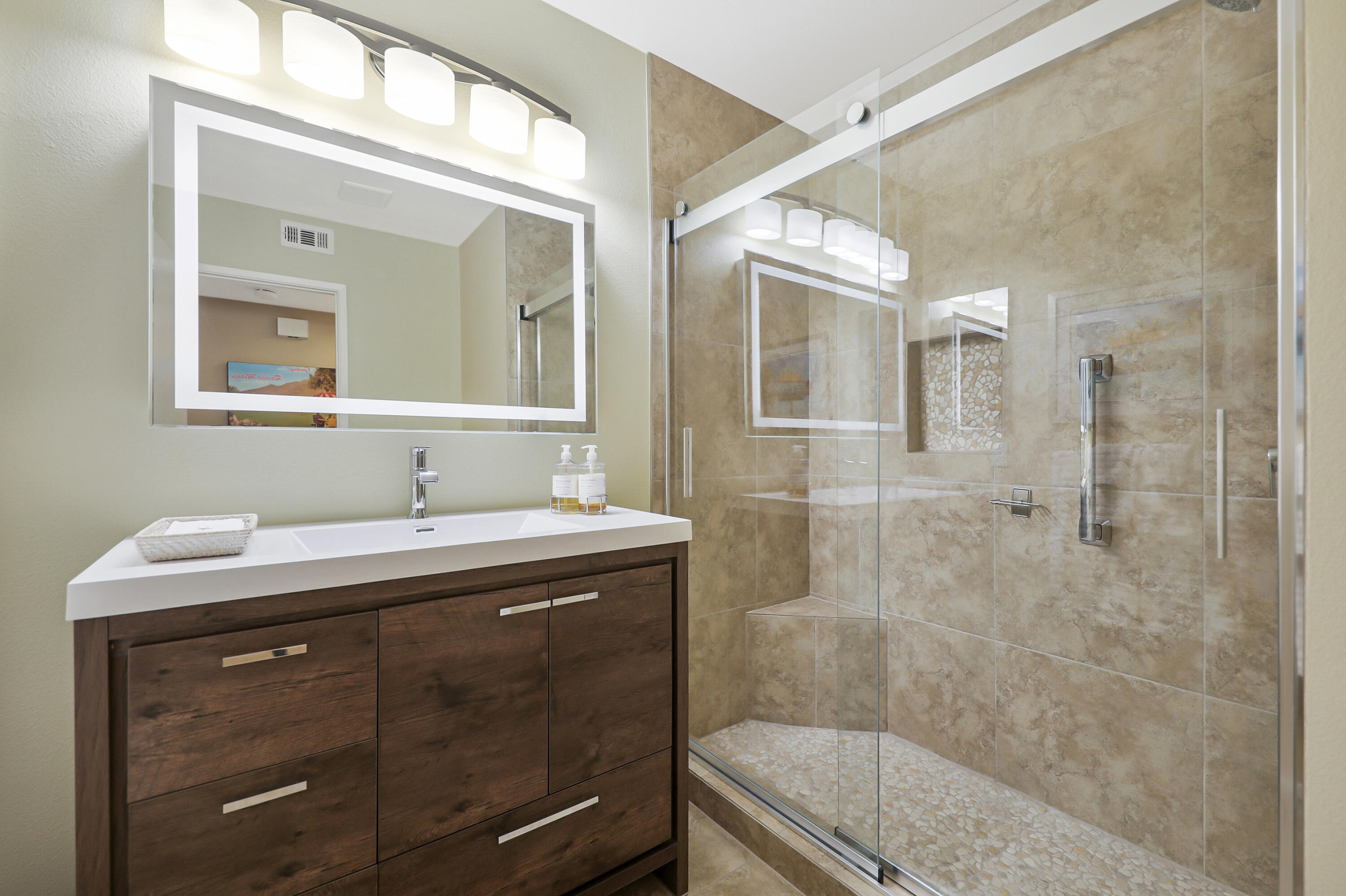 35 La Ronda Drive Rancho Mirage, CA 92270 - Photo 18 of 54 a bathroom with a granite countertop sink mirror and double