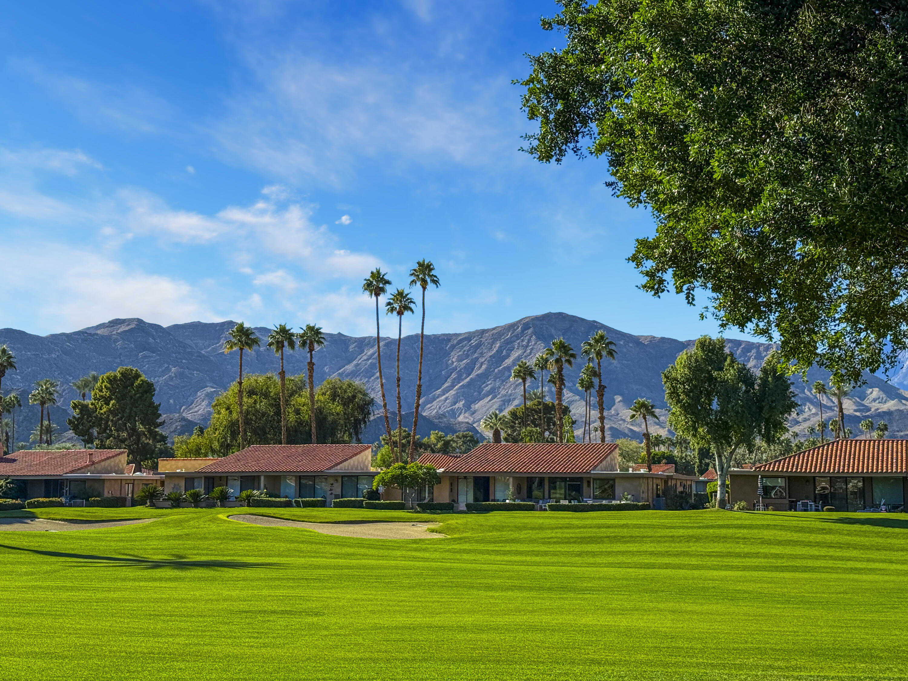 35 La Ronda Drive Rancho Mirage, CA 92270 - Photo 26 of 54 a view of a city with tall buildings