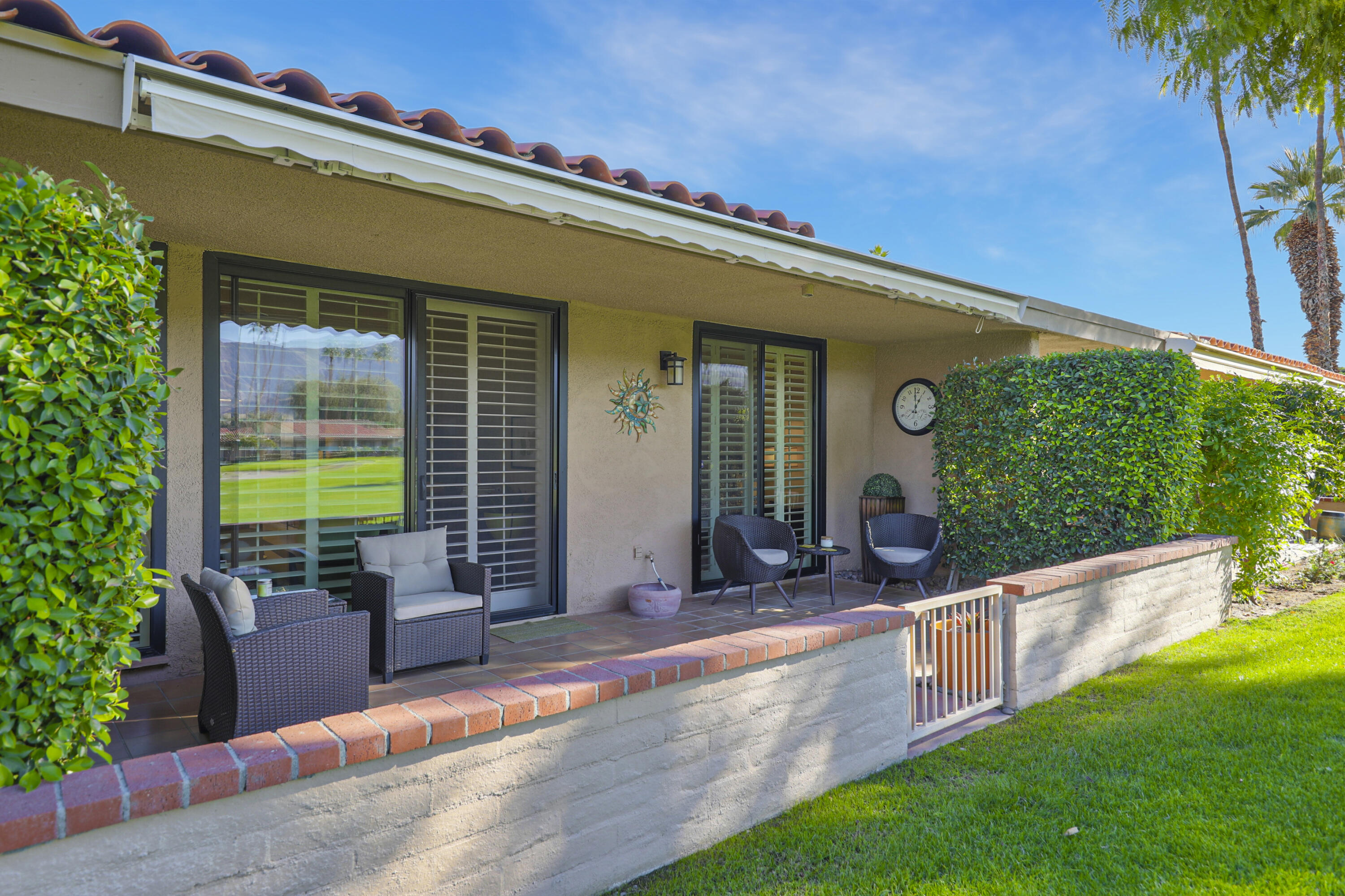 35 La Ronda Drive Rancho Mirage, CA 92270 - Photo 29 of 54 a view of an house with backyard and porch