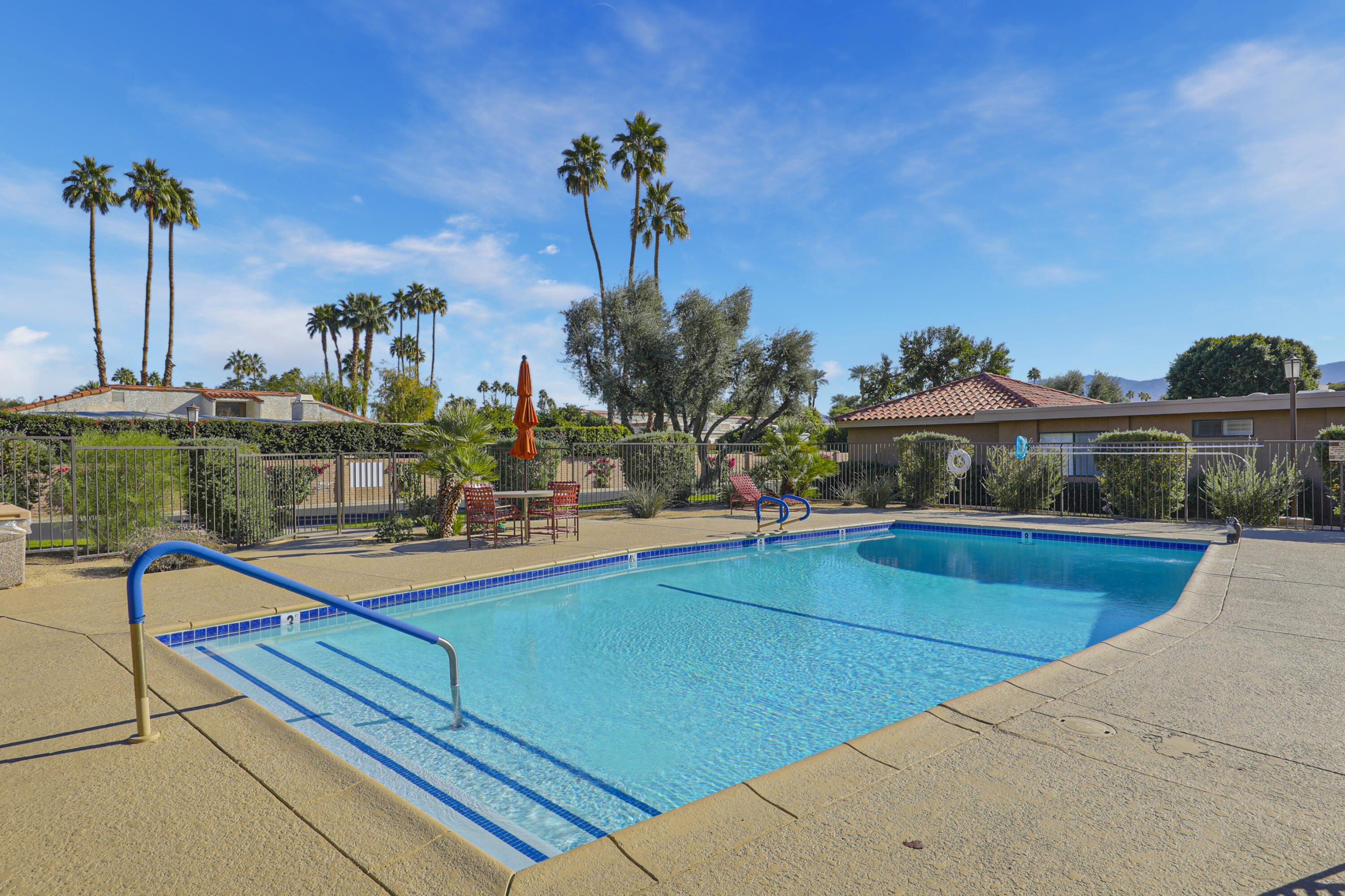 35 La Ronda Drive Rancho Mirage, CA 92270 - Photo 32 of 54 a view of a patio with swimming pool