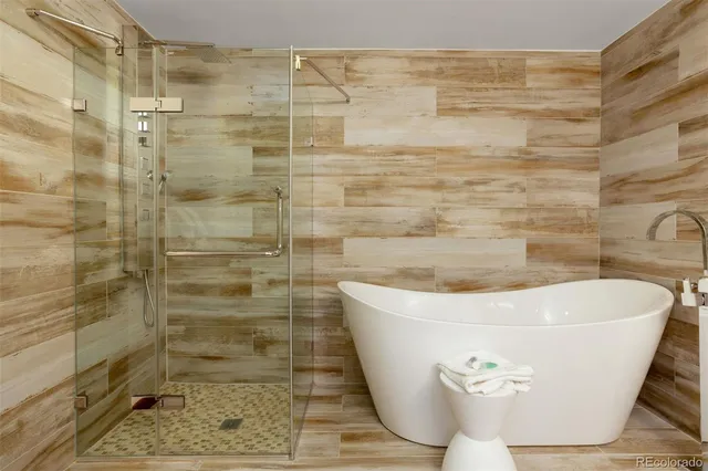a white bath tub sitting in a bathroom