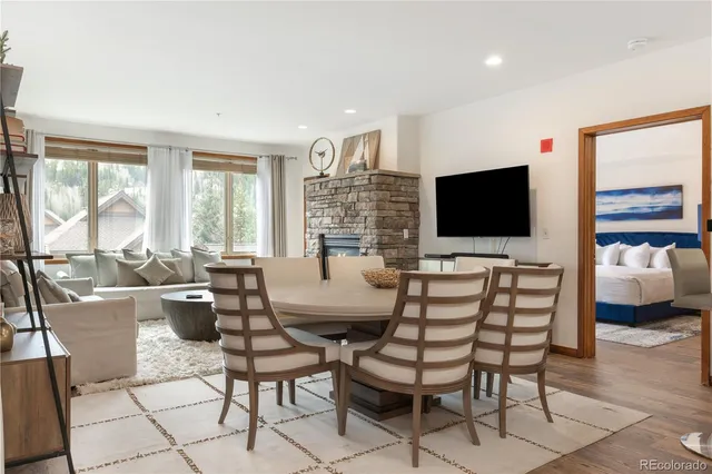 a view of a livingroom with furniture and a flat screen tv
