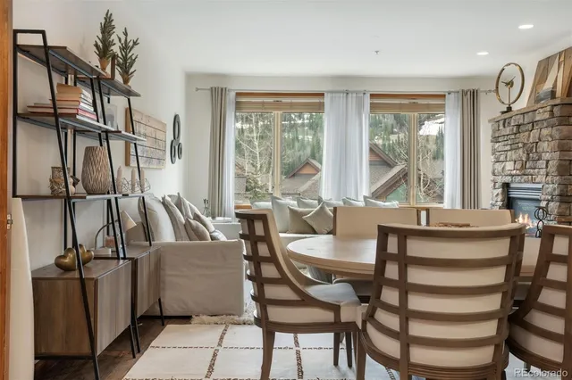 a view of a dining room with furniture window and outside view