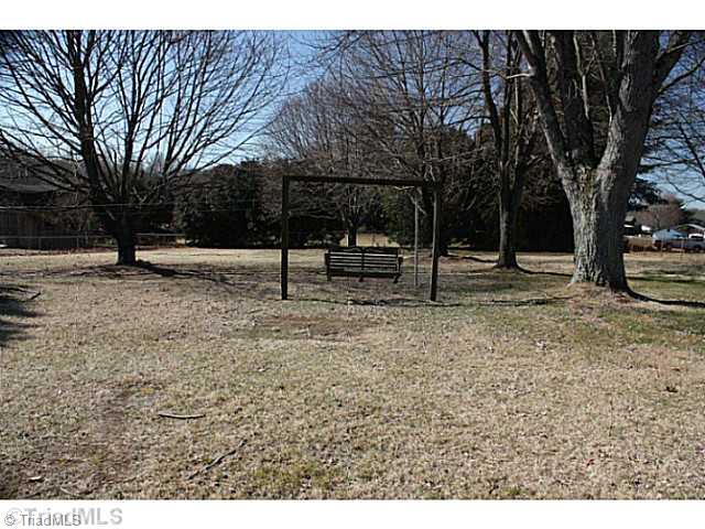 942 South Franklin Road Mount Airy, NC 27030 - Photo 15 of 16 Exterior Back. Great Flat Lot w/ Swing Waiting for You!