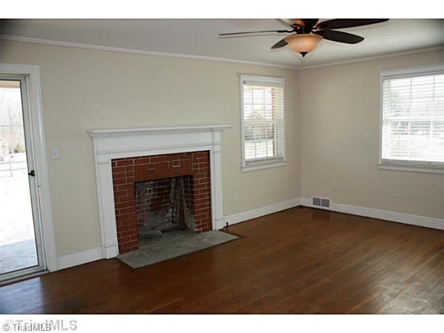 Living Room. Great Natural Light and Plenty of Space Greet You in this Beautiful Living Room.