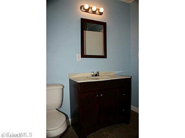 942 South Franklin Road Mount Airy, NC 27030 - Photo 9 of 16 Bath. Recently Renovated Bathroom w/ Neutral Colors & Potential to House a Stackable Washer & Dryer.