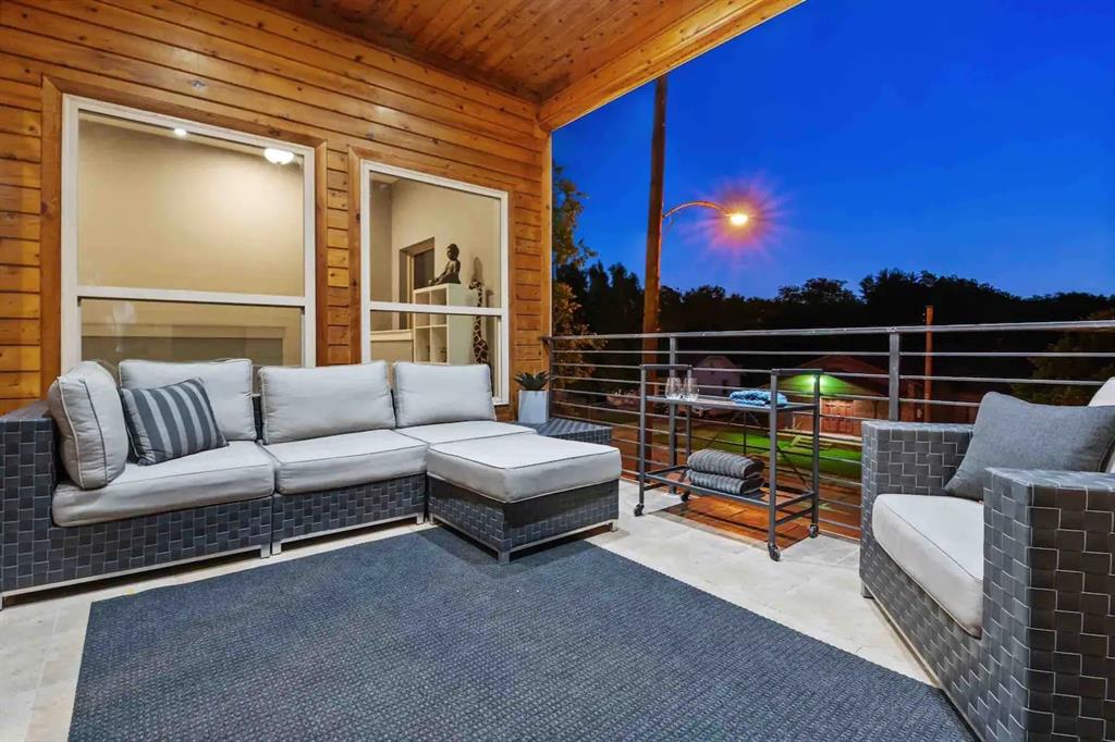 3807 Vilbig Road Dallas, TX 75212 - Photo 26 of 40 a roof deck with couches and city view