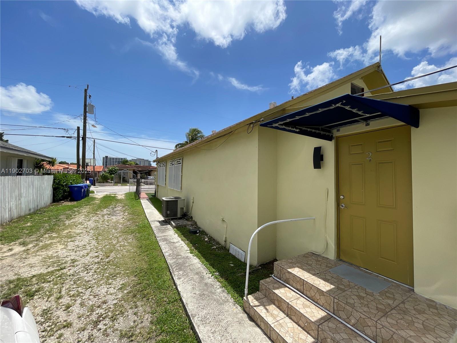 3157 Southwest 17th Street, Unit B Miami, FL 33145 - Photo 14 of 18 a house view with a backyard space