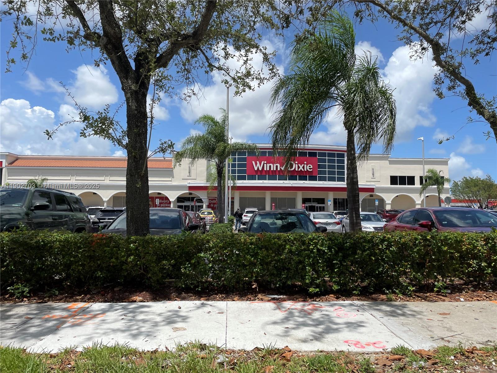 3157 Southwest 17th Street, Unit B Miami, FL 33145 - Photo 17 of 18 a sign that is sitting on a brick wall