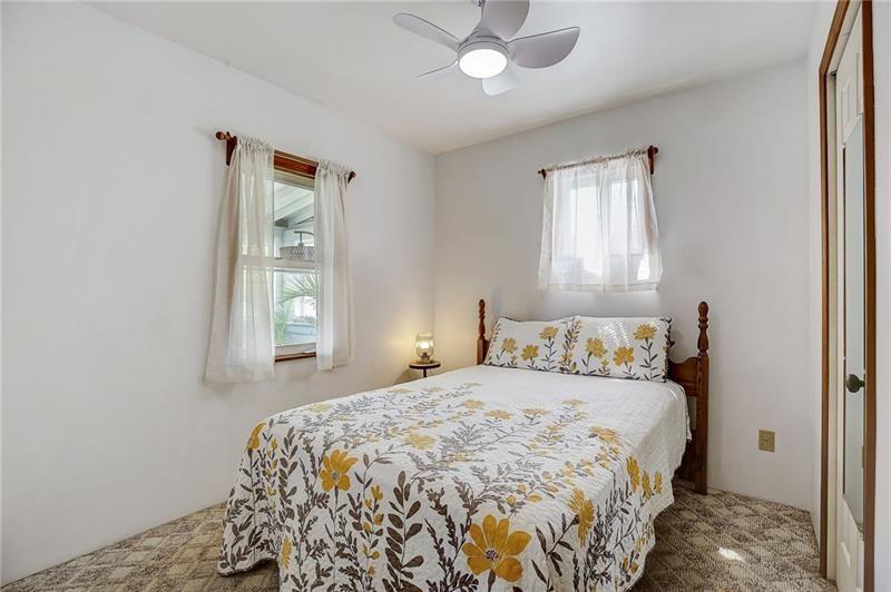 952 Seybertown Road East Brady, PA 16028 - Photo 11 of 46 a bedroom with a bed and a window