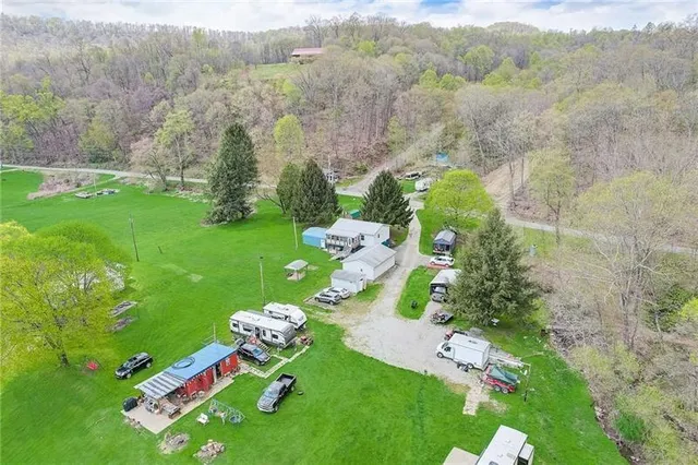 a backyard of a house with lots of green space
