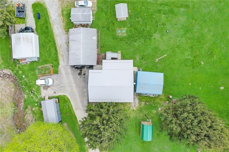 952 Seybertown Road East Brady, PA 16028 - Photo 40 of 46 an aerial view of a house with a garden