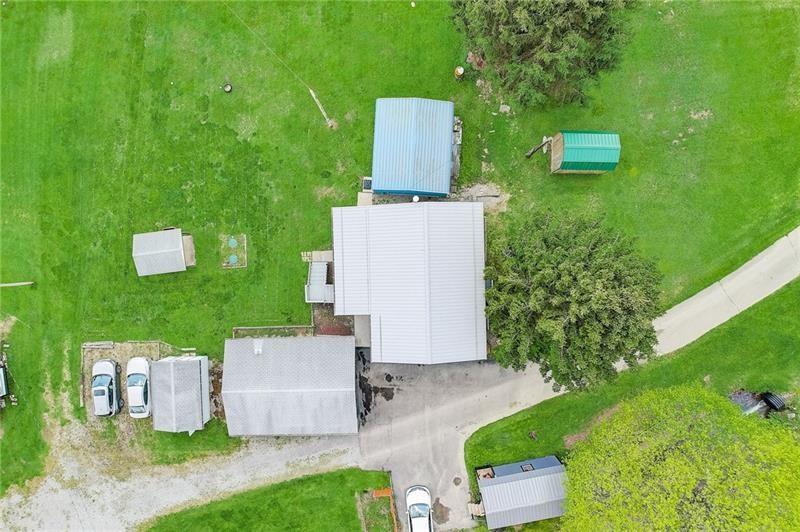 952 Seybertown Road East Brady, PA 16028 - Photo 41 of 46 an aerial view of a house with a yard